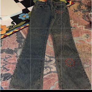 Cache Dark Wash Flare Jeans with Red and Silver Stud Embellishments